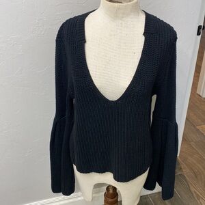 Free People black V neck knit bell sleeves sweater size medium.